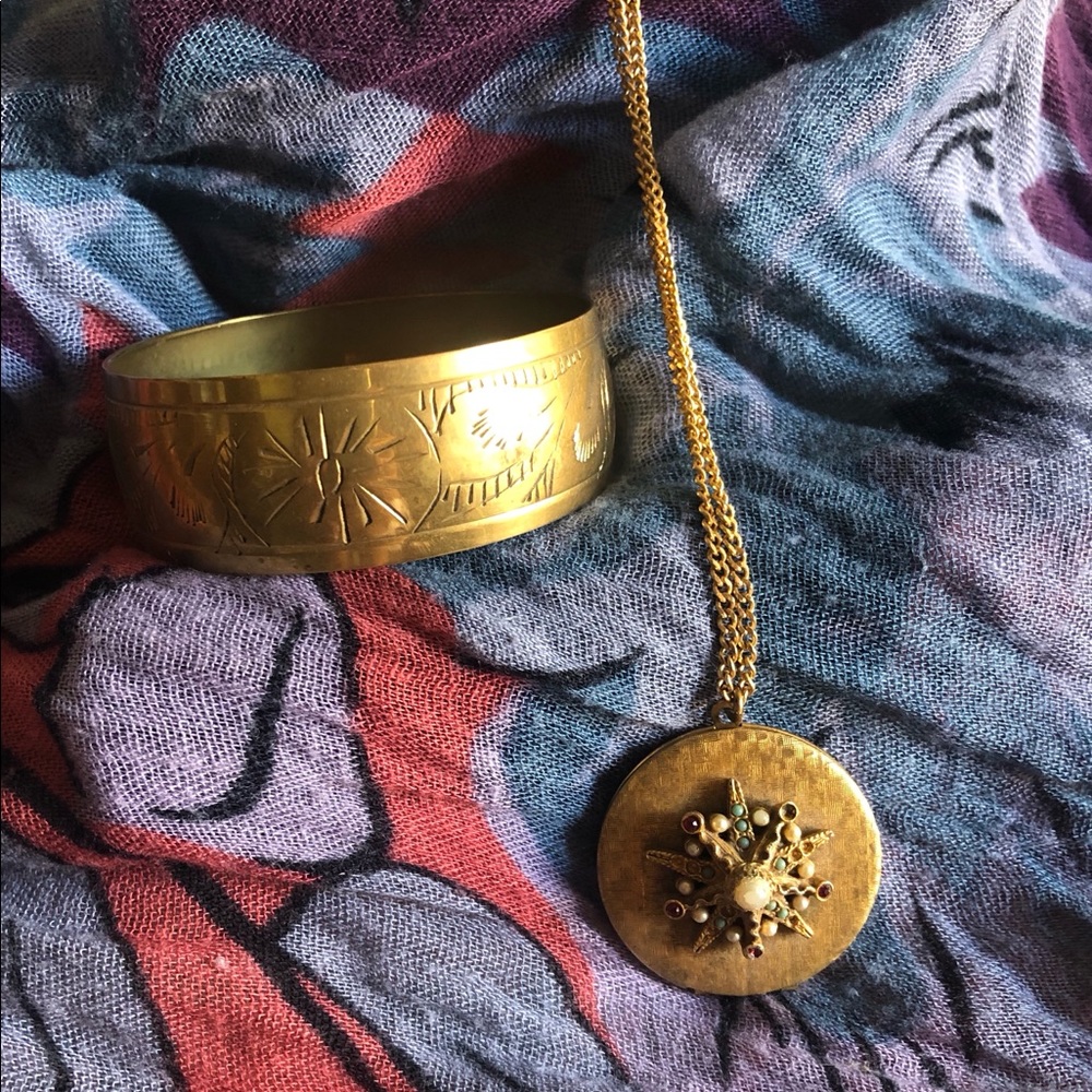 Brass bangle and fashion locket.